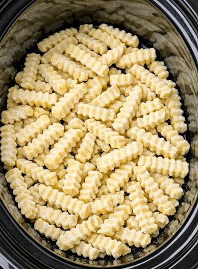 4-Ingredient Slow Cooker Cheesy Onion Fries