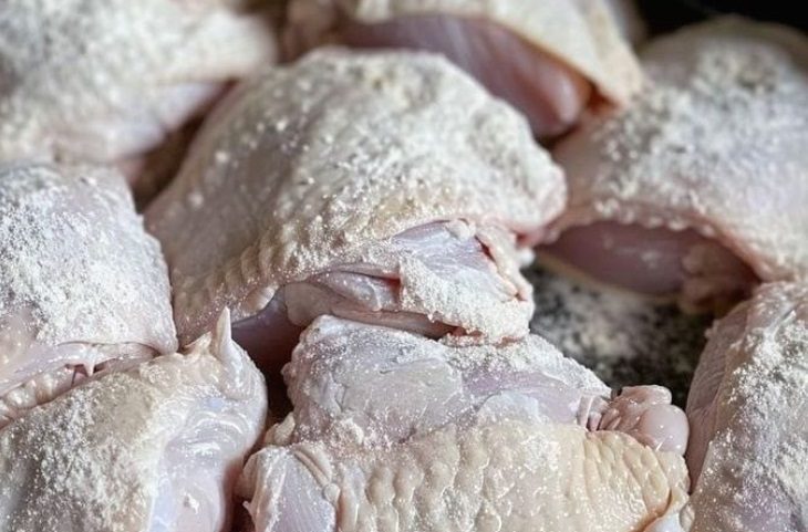 Coat chicken in flour and toss in slow cooker. With only 4 more ingredients, get a terrific dinner