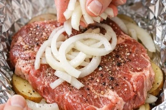 Layer onions and these 2 ingredients with steak for a baked dish you’ll never get tired of