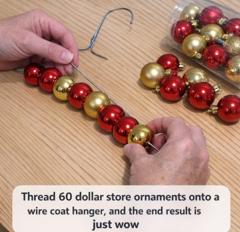Thread 60 dollar store ornaments onto a wire coat hanger, and the end result is just wow