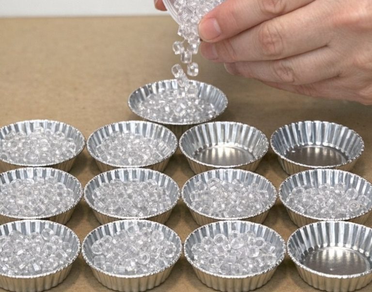 Fill 12 dollar store mini tart tins with clear pony beads, and the end result is magical